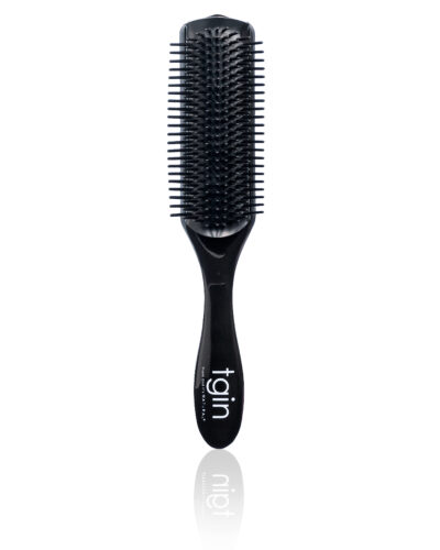 Define and Style Detangling Brush that detanlges with gentle bristles that defines curls.