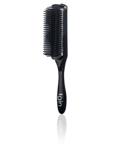 Define and Style Detangling Brush that detanlges with gentle bristles that defines curls.